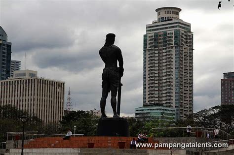 Lapu-lapu Monument between G.E. Antonino Building and the Sunview Palace Tower