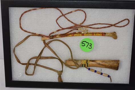 At Auction 2 Bone War Whistles