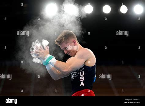 Shane Wiskus, of the United States, reacts after finishing his ...