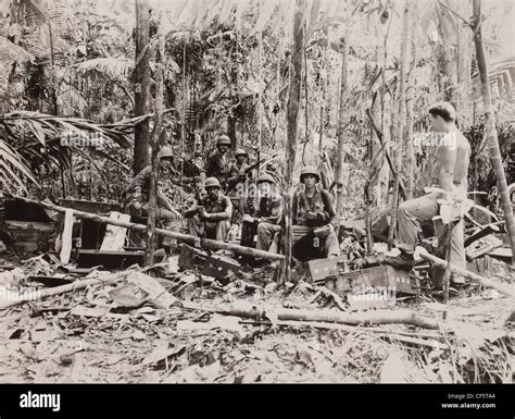 US Marine Corps WWII Pacific Campaign A Marine Patrol Pauses For A