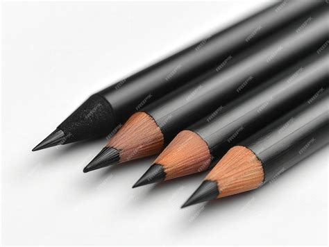 closeup   graphite pencils  black exteriors arranged   row