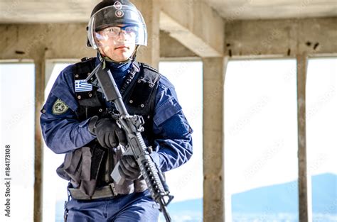 Police special forces, blue uniform and protection helmet Stock Photo ...