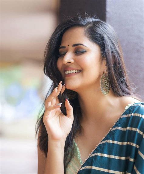 Anasuya Bharadwaj Looks Gorgeous In A Navy Blue Saree For Jabardasth