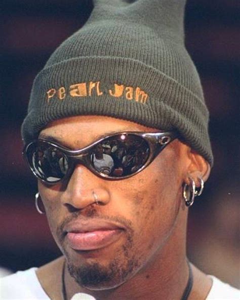 Dennis Rodman In Oakley Shades A Pearl Jam Beanie At A Playoff Press