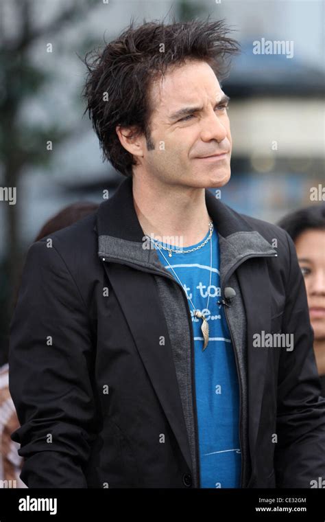 Train lead singer Pat Monahan films an interview for the entertainment ...