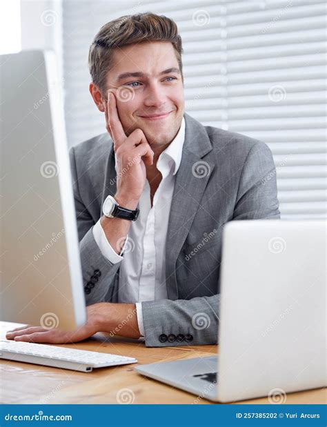 Hes Young and Ambitious. a Handsome Young Executive Working in His Office. Stock Photo - Image