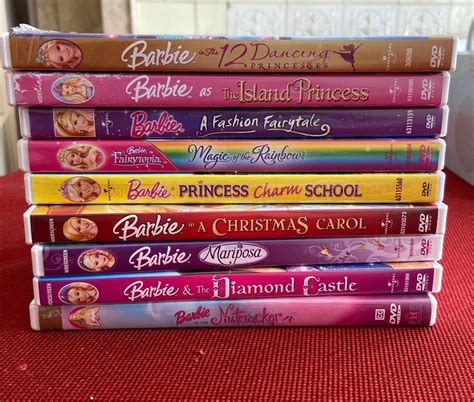 Lot Of Barbie Dvds On Mercari In 2021 Barbie 2000s Childhood