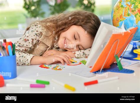 Girl Sleeping On Books Stock Photo Alamy