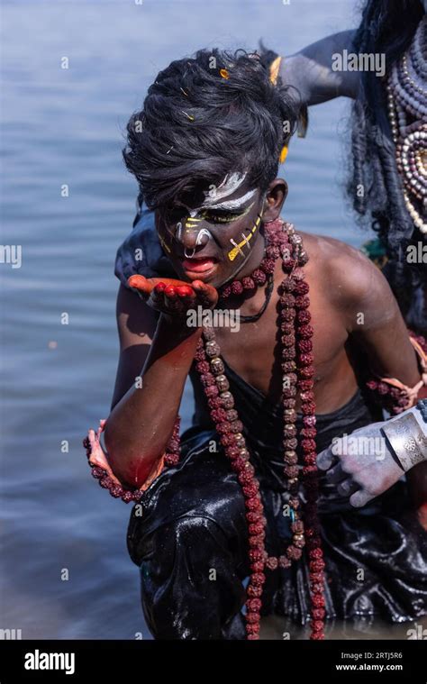 Masan Holi, Portrait of an male artist with painted face act as lord ...