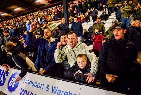 19 pictures of Grimsby Town fans during the 3-1 victory over Stevenage at Blundell Park ...