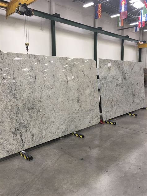 Two Large Marble Slabs Sitting In A Warehouse