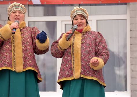 Women in Russian Folk Costume and Accordionist Sing Songs at a Holiday ...