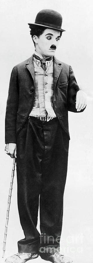 Actor Charlie Chaplin In Costume by Bettmann