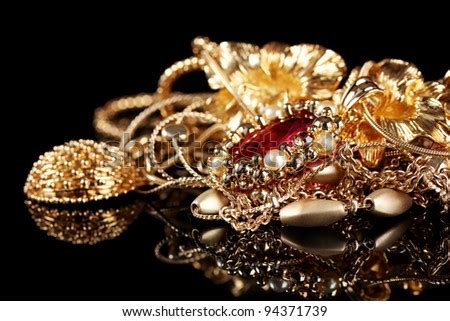 Various Gold Jewellery On Black Background Stock Photo Edit Now