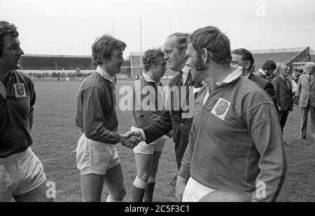 Llanelli Captain Roy Shunto Thomas Holds The WRU Cup Aloft After