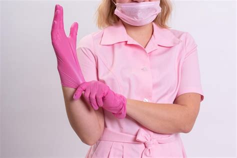 Premium Photo Background With A Beautician In A Pink Bathrobe Wearing