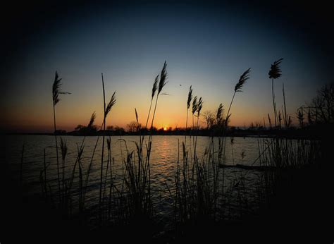 Lake St. Clair Sunset Serenity Photograph by Kevin Coil - Pixels