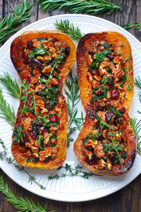 Sausage Stuffed Butternut Squash With Spinach Pecans And Cranberries