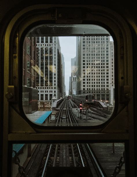 Window Train Overlooking Buildings · Free Stock Photo