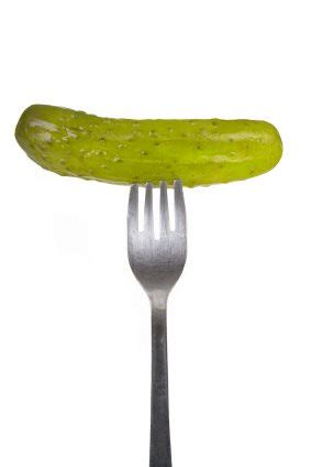 Dill Pickle | A crisp, fresh dill pickle on a fork. Isolated… | Flickr