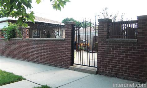 Older brick fence with metal gate picture | interunet