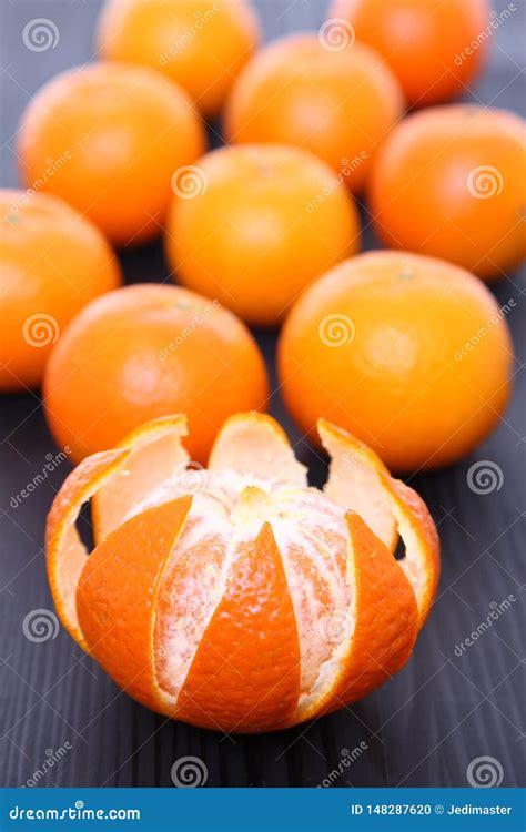 Peeled Orange Fruit Citrus Tankan Against Dark Background Stock Photo