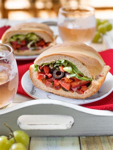 Vegan Pan Bagnat (Mediterranean Salad-Stuffed Bread) - The Vegan Atlas