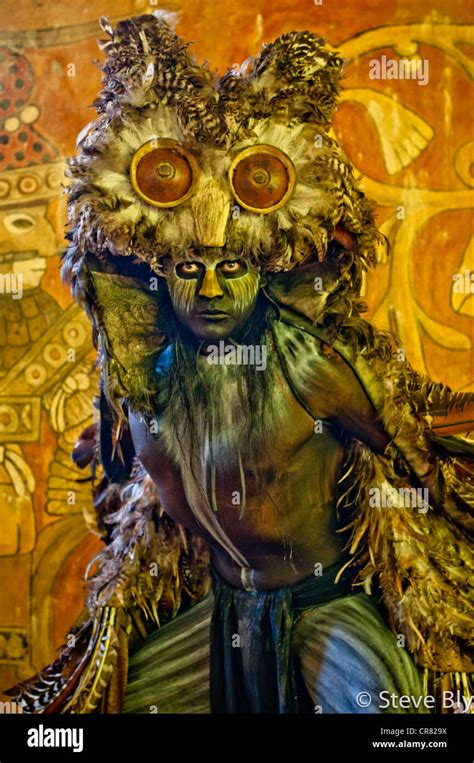 A Maya Dancer/Actor Buho (Owl) in costume performing a Mayan Ritual at ...