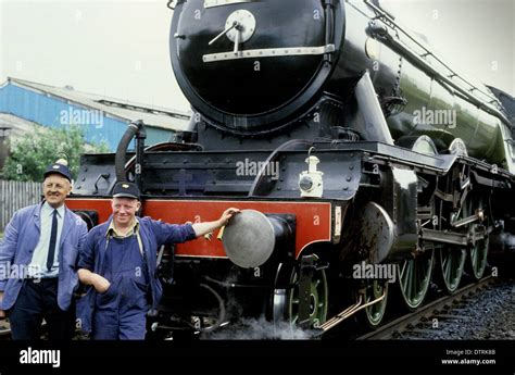 Proud train drivers with the Flying Scotsman steam locomotive pulling The North Yorkshireman ...