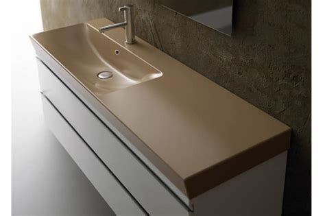 Lavabo In Ceramica Con Piano D Appoggio Laterale IDFdesign