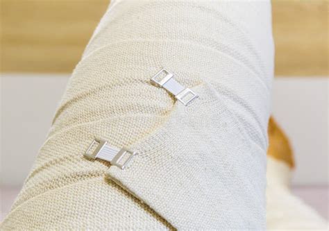 Human Leg Wrapped with Elastic Medical Bandage Outstretched on Bed Stock Image - Image of ...