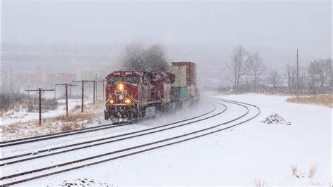 Railfanning Around Calgary In Heavy Snow Trains On CPR S Laggan And