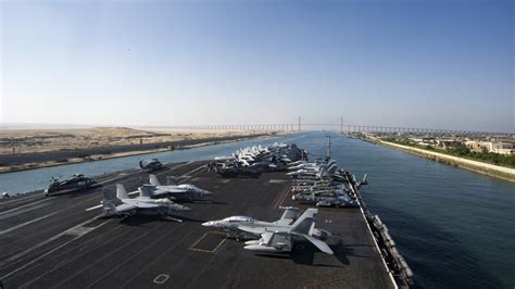 The aircraft carrier USS Dwight D. Eisenhower (CVN 69) approaches the ...