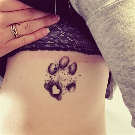 People are "Branding" Themselves with Dog Paw Tattoos