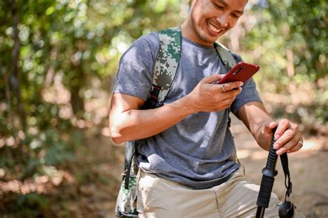 Premium Photo Cropped Image Of A Happy Asian Male Traveler With