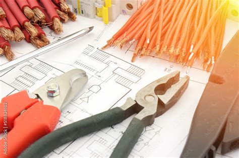 Electrical tools and materials for the installation of an electrical panel on an electrical ...