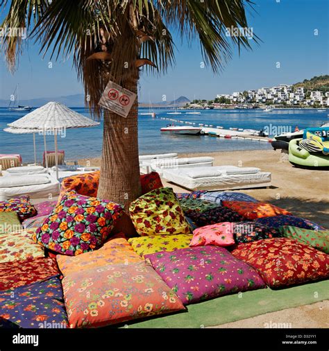 Colorful Seating Cushions Under A Palm Tree Bitez Beach Bodrum Mugla