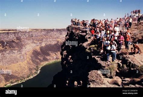 Crowds watch Evel Knievel attempt to jump over the Snake River Canyon ...