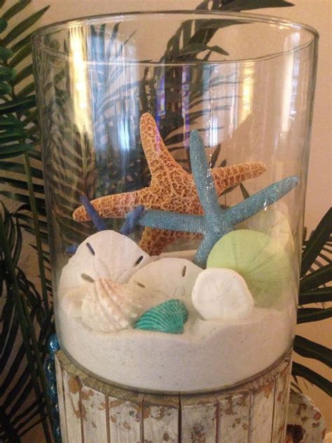 Sea Inspired Diy Display With Sand Starfish Shells And Sea Urchins