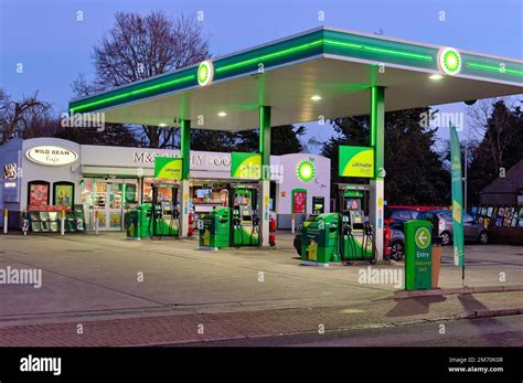 forecourt   bp petrol station  dusk   marks  spencer