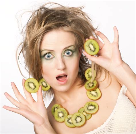 Premium Photo Happy Woman Holding Kiwi