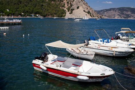 Motor Boats Moored At The Sea Bay Small Fisher Boats Tied In Harbor In