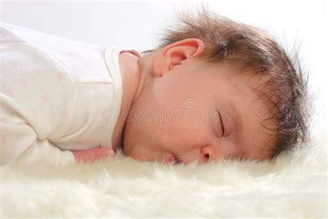 Baby Sleeping On White Fur Stock Photo Image Of Mouth Brightly