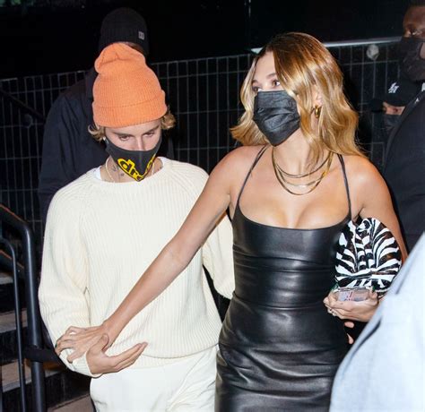 Hailey Bieber In A Skintight Black Dress And Zebra Bottega Veneta Bag