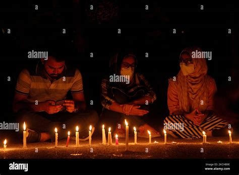 Journalists And Students Light Candles And Pay Tribute To Reuters