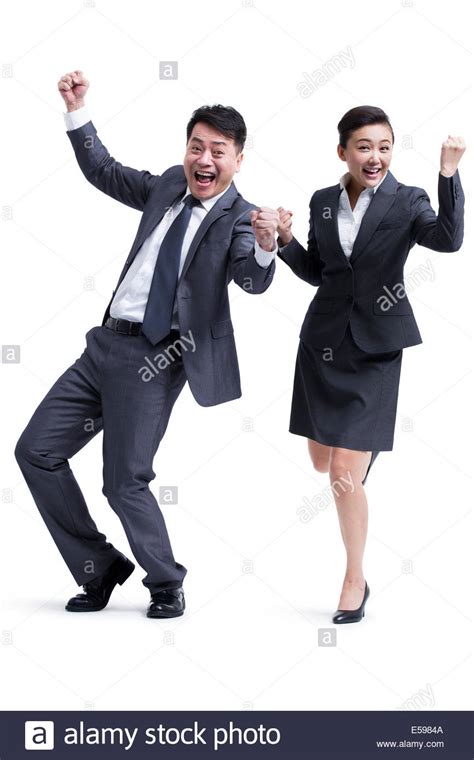 Excited business people celebrating Stock Photo - Alamy