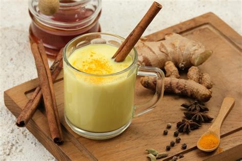 Premium Photo Turmeric Golden Milk Latte With Spices Detox Immunity Boosting