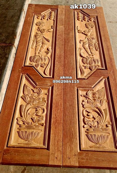 Carved Wooden Doors With Carvings On Them