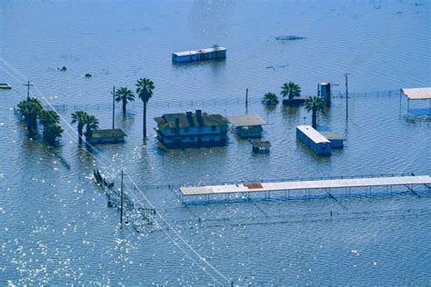 photo - Flooded Fields and Structures Caused by Flood Waters - Public ...