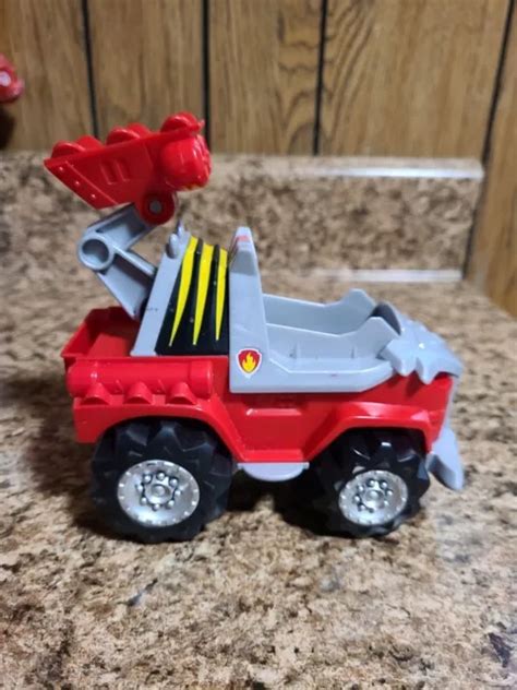 Paw Patrol Dino Rescue Marshall Deluxe Rev Up V Hicule Spin Master